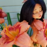 Hope doll with flower
